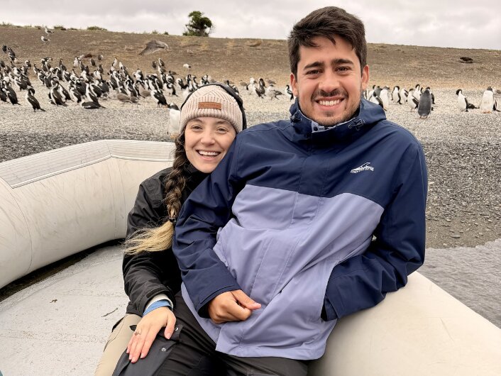 Founders of Tailored Argentina enjoying a local experience with penguins during a custom Patagonia trip.
