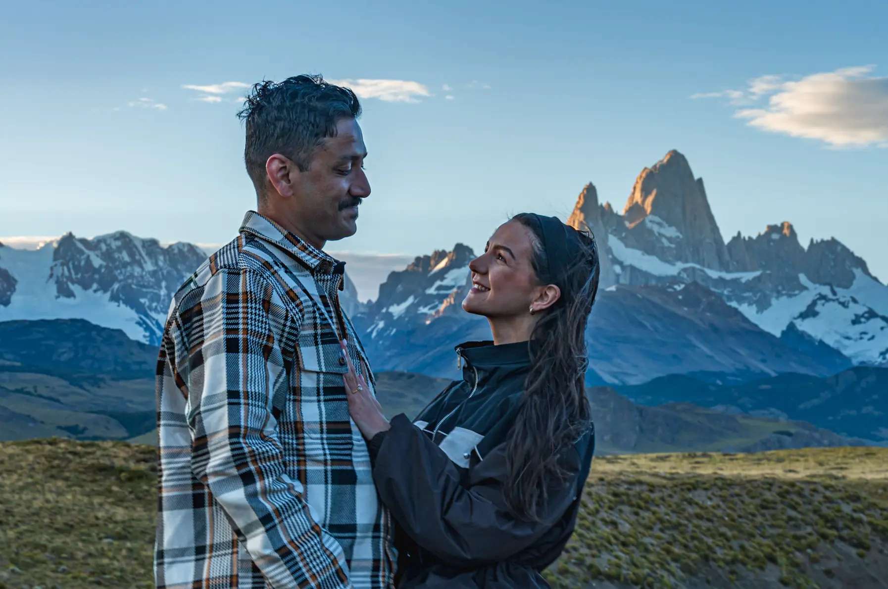 Adarsh and Ella's scenic proposal moment in Patagonia, arranged by a luxury Argentina travel agency.